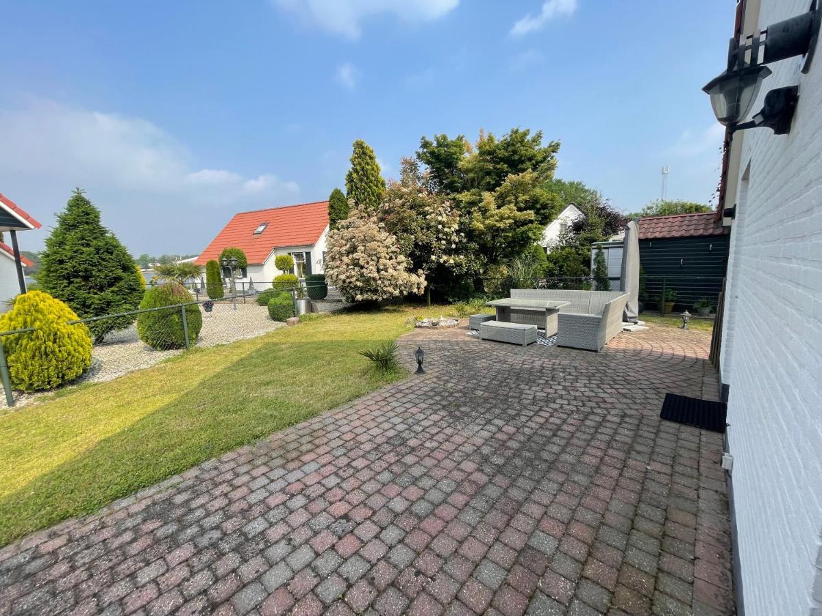 Freistehendes Ferienhaus Am See Naehe Roermond Heel Exterior foto